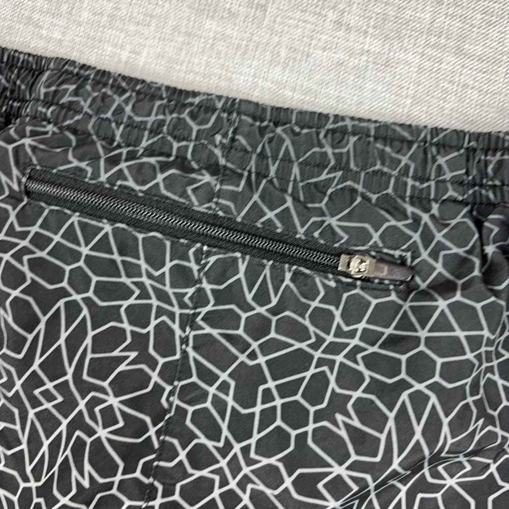 Nike Dri-FIT Running Shorts Mens Small Black 4 Inseam Lined Zip Pocket Geometric
